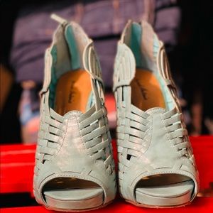Light blue huarache style heels.